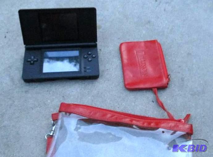 nintendo DS red- NOT TESTED no charger...