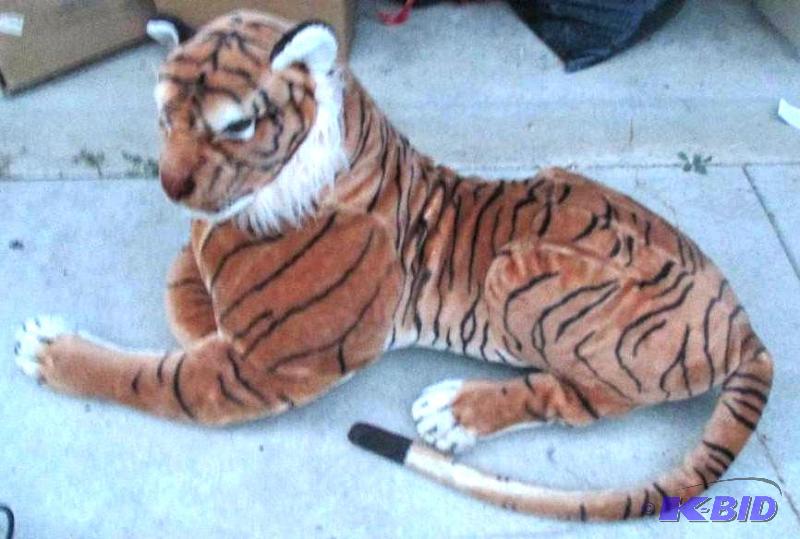 very large stuffed tiger...