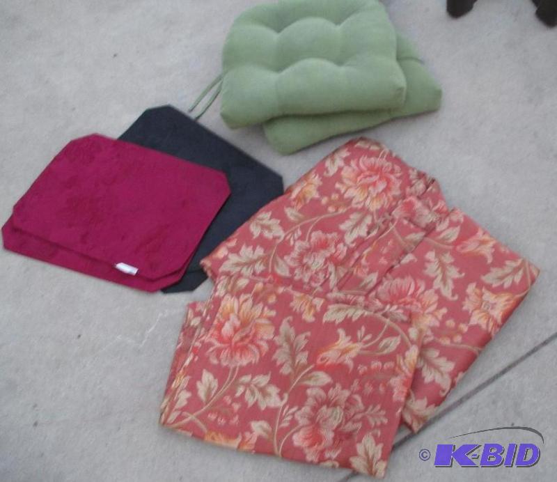 drapes tabbe settings and seat pillows...