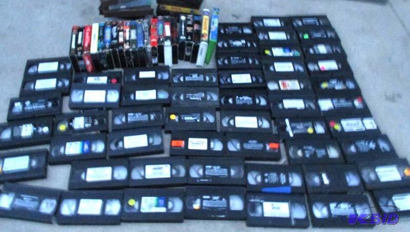 mixed lot of VHS tapes and extra empty cases...