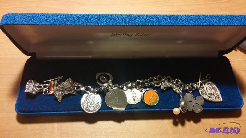 Sterling Silver Bracelet with Charms...