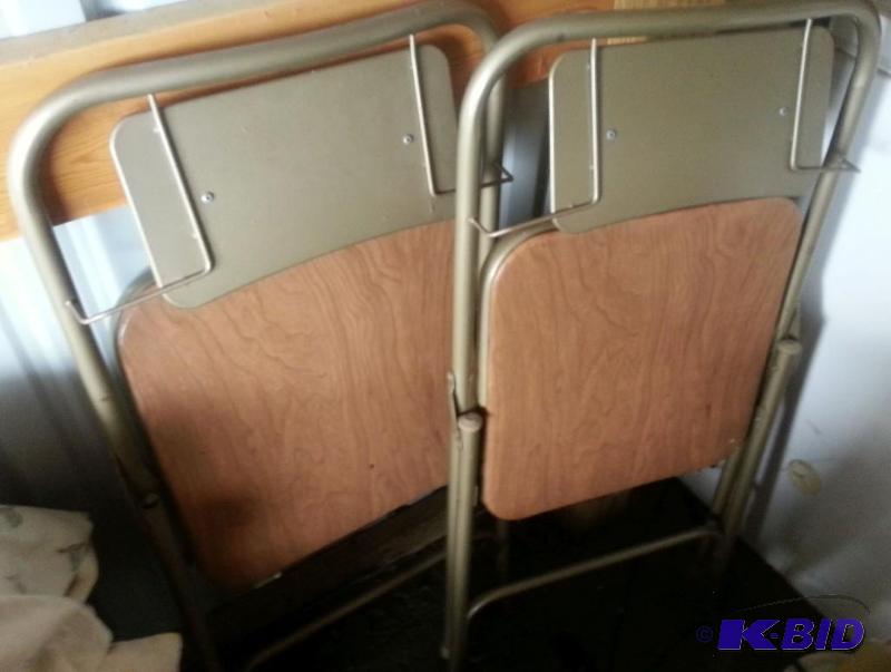 2 Folding Chairs...