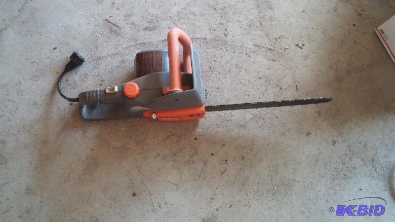 lot 3 image: Remington Electric Chainsaw...