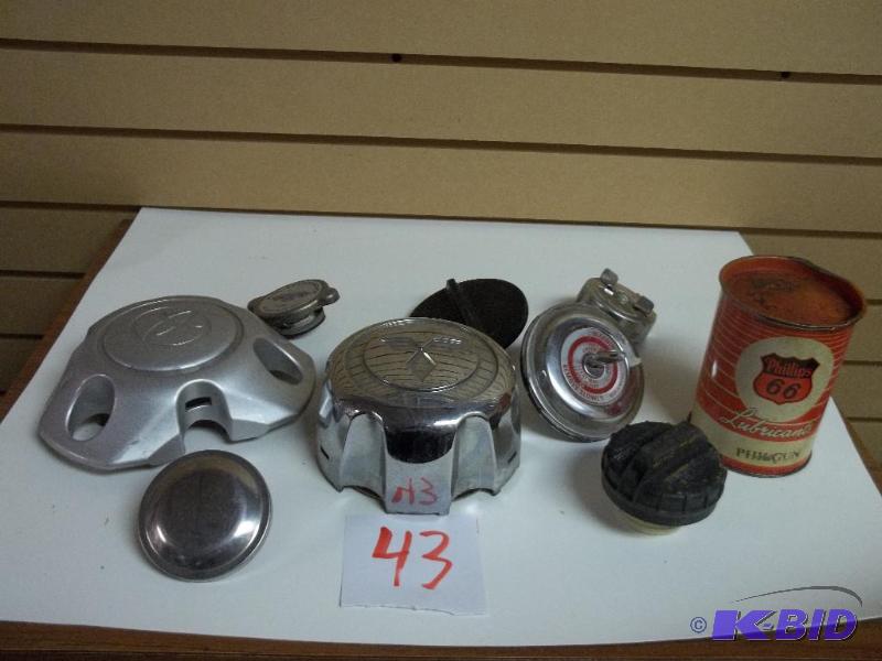 assorted center caps and Phillips 66 can...