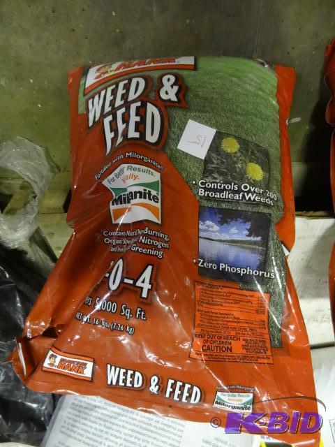 lot 15 image: Approx 16 lbs. Hardware Hank Weed and Feed 24...