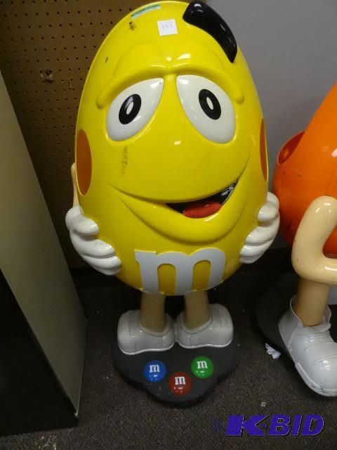 lot 197 image: USED MandM Candy Character, Yellow. Was used ...