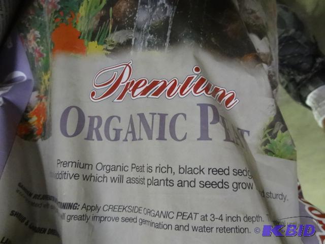 lot 34 image: Approx 3 Cubic Ft. Organic Peat (qty 3 bags)...
