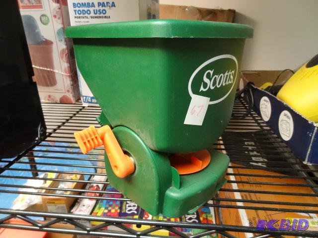 lot 67 image: NEW Scotts Easy Hand Held Spreader Model 7103...