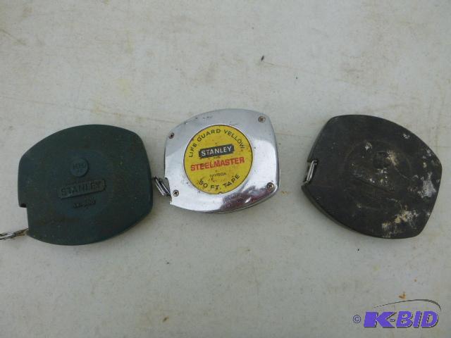 lot 149 image: 3 Stanley 50 Tape Measures...