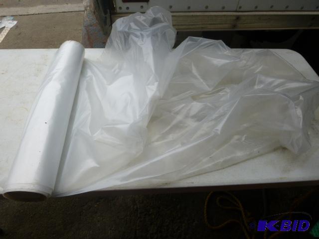 lot 218 image: Roll of Plastic Approximately 8 wide....