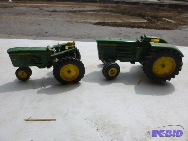 lot 258 image: 2 Cast Iron John Deere Tractors 1 has a bad w...