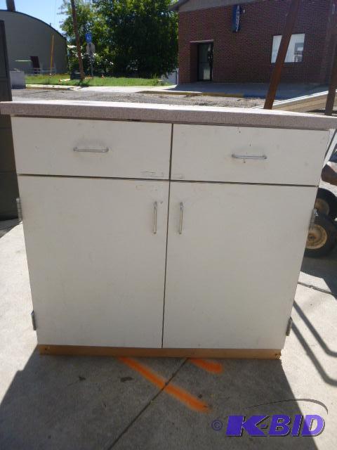 lot 88 image: Storage Cabinet full of Miscellaneous Items 3...