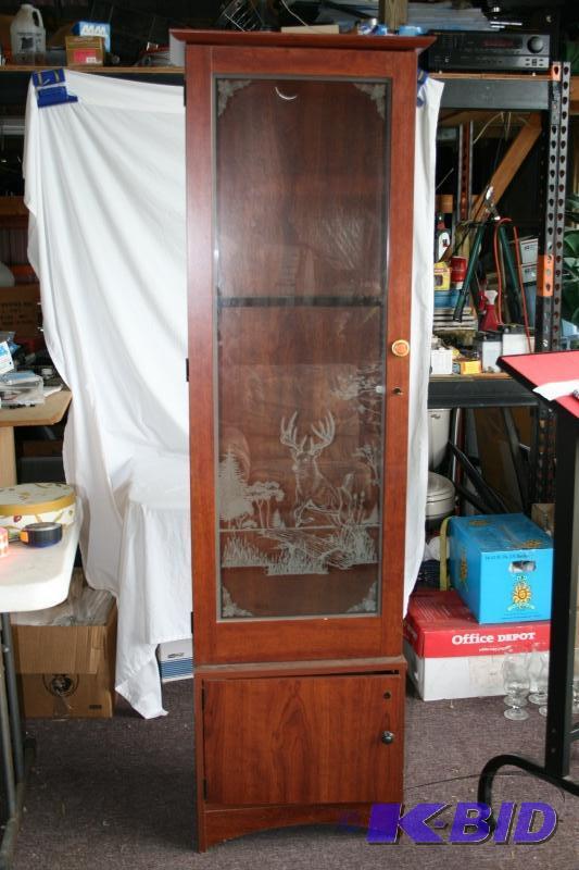Gun cabinet, holds 6 guns, locks and has the ...