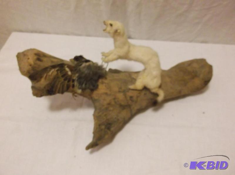 lot 4 image: Weasel mounted on log with half eaten bird ap...