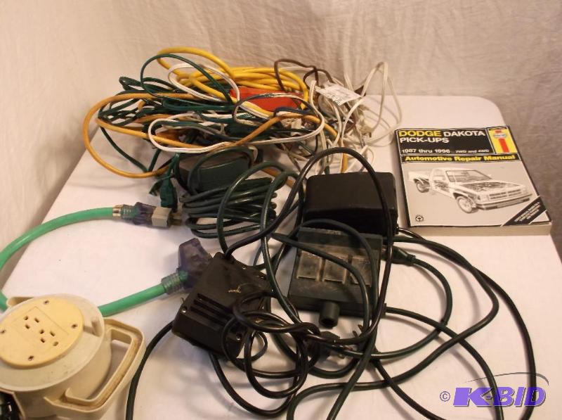 lot 49 image: Box full of power cords & Dodge Dakota re...