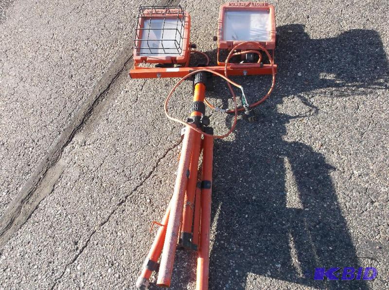 lot 69 image: Power Lite double light on tri pod one leg ne...