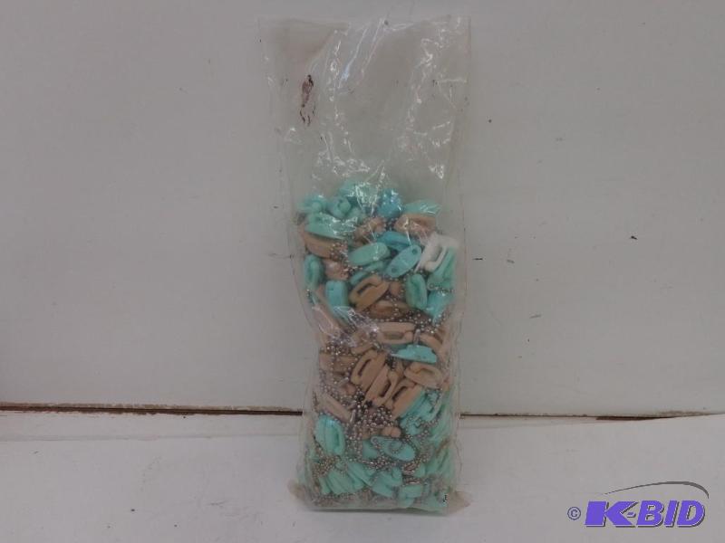 lot 216 image: Bag of Telephone Key Chains Blue Green&nbsp ...