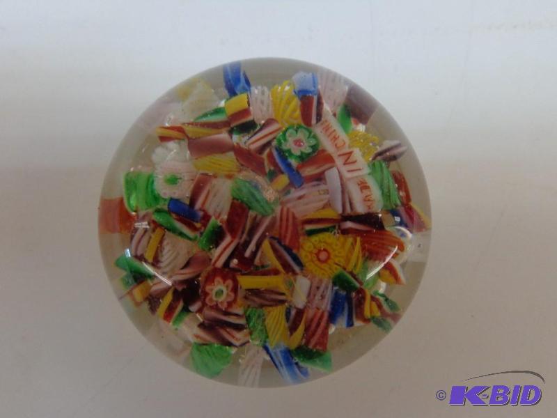 lot 23 image: Paper Weight Made In China Inside of the Glas...