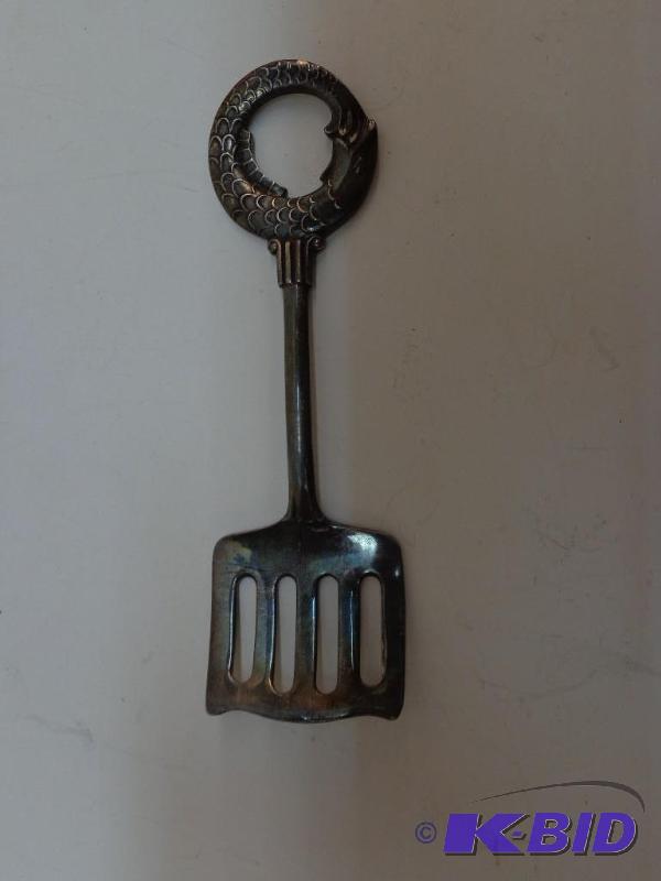 lot 35 image: Small Sugar Cube Spoon Made In Sweden CG Hima...