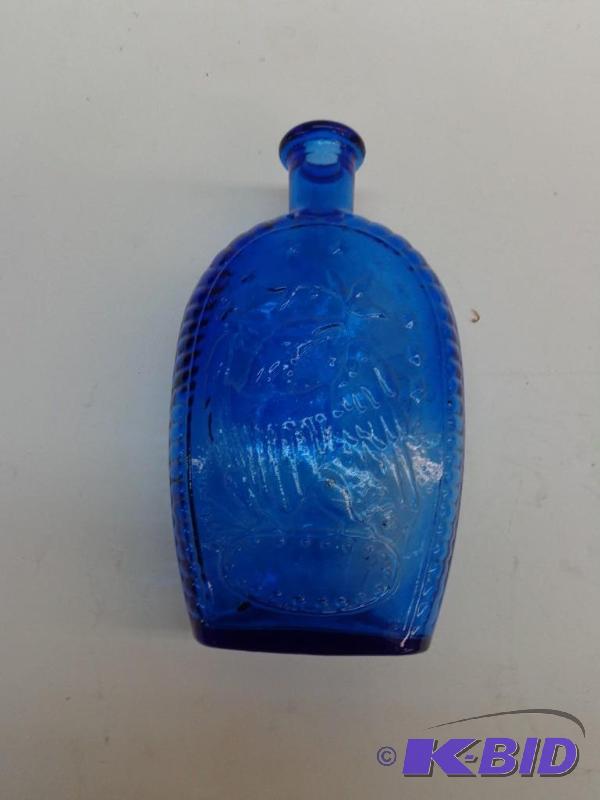 lot 55 image: General Washington Glass Bottle Blue Opal Gla...