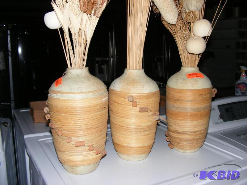 Three Clay PotVases with dried grasses...