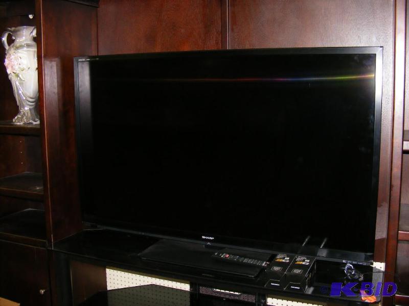 60 HD Sharp TV 3-D, with remote and two pai...