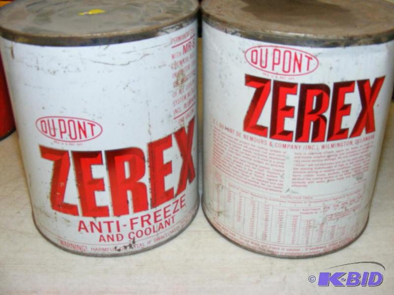 two old cans of DuPont Zerex Anti-Freeze...