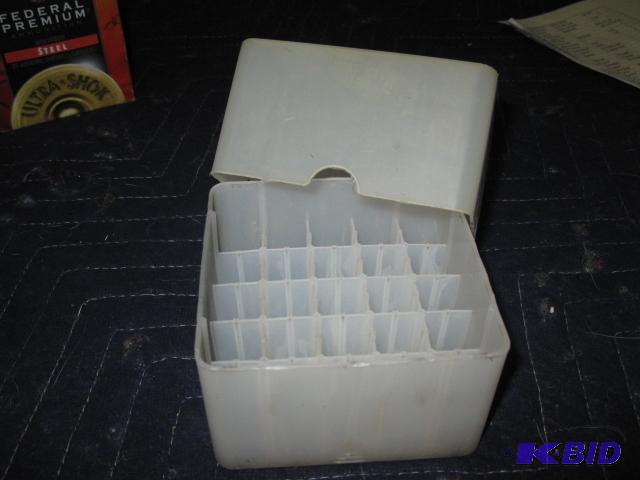Shotgun shell holder, believed to be 20 ga....