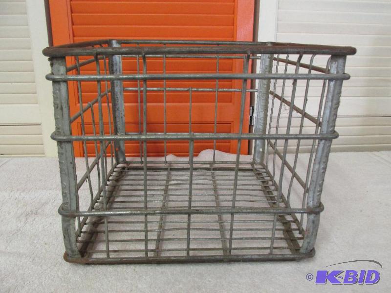 lot 101 image: Vintage Metal Dairy Crate.