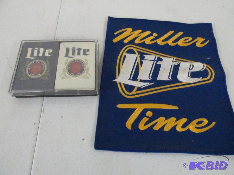 lot 109 image: Miller Lite Patch and Two Decks of Playing cards, New in box
