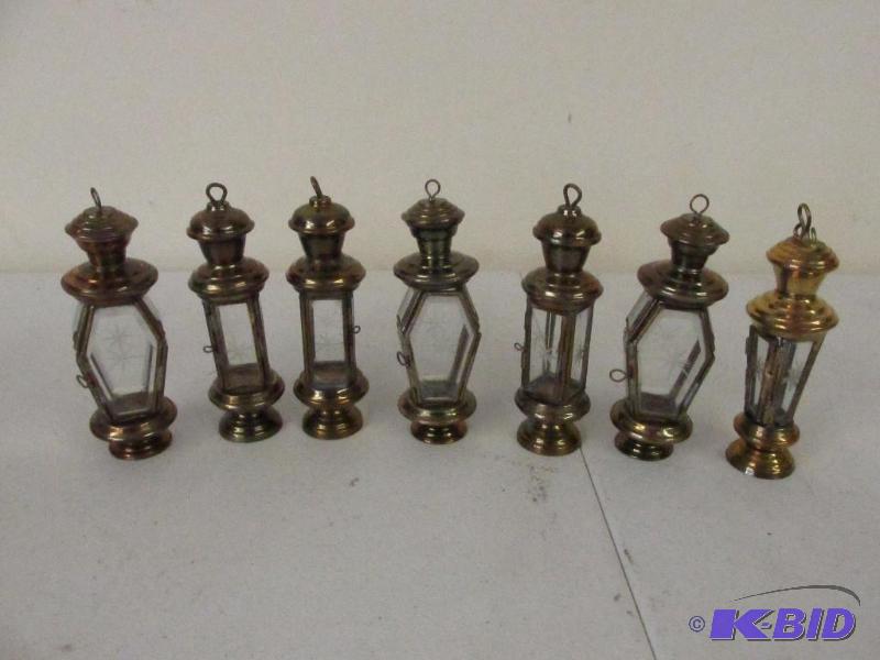 lot 120 image: Brass Lamp Ornaments.