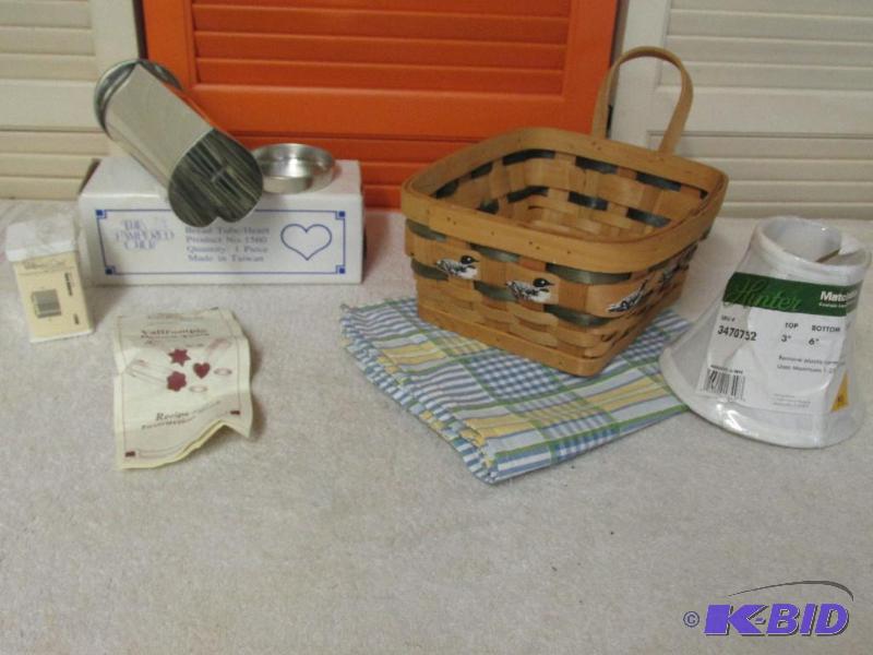 lot 126 image: Pampered Chef Bread Tube,  Basket with Loons and a Lamp Shade.