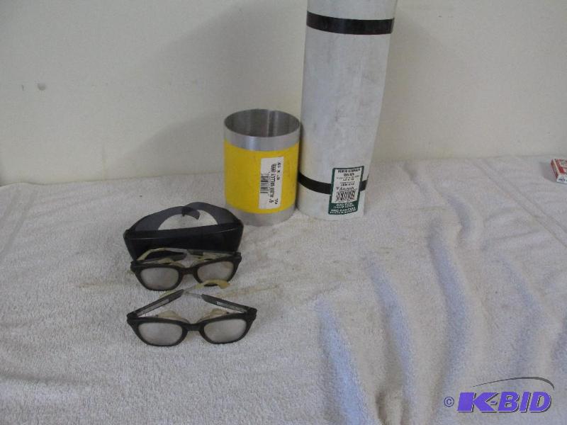 lot 146 image: Two Rolls of Aluminum and 3 pair of Safety Glasses.