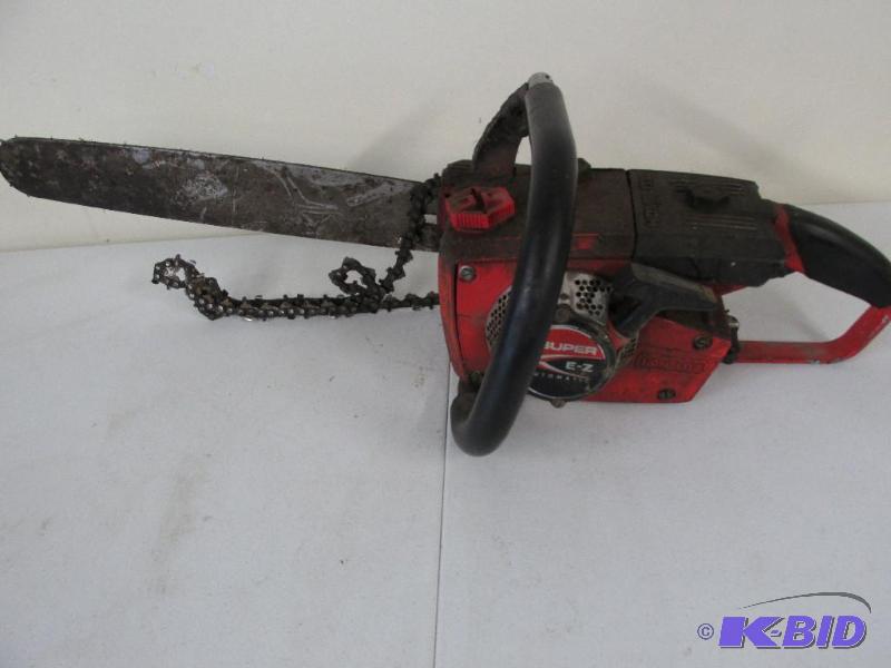 lot 150 image: Homelite Super E Z Chainsaw Parts or Repair.