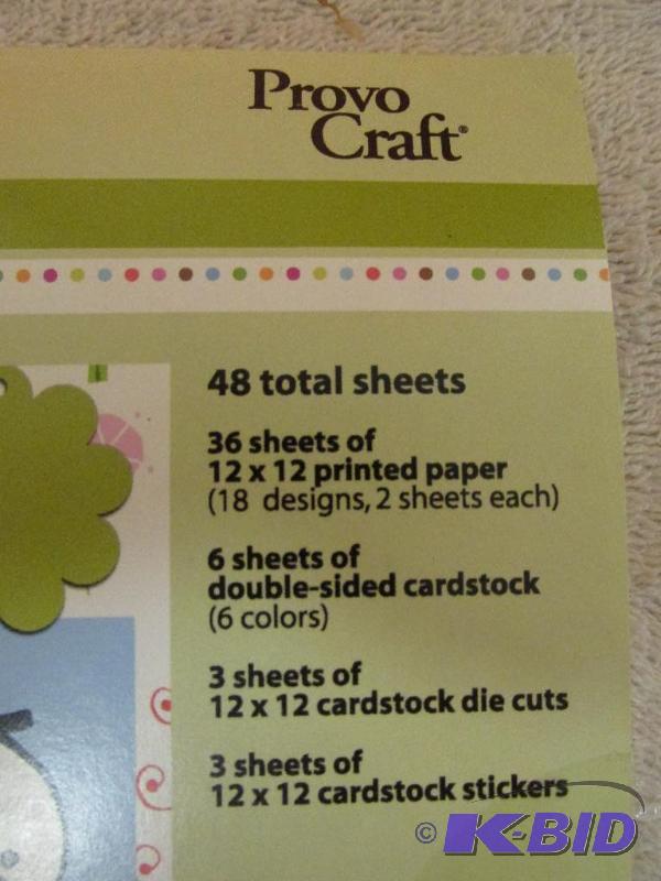 lot 65 image: Provo Craft Book of Holiday Paper - Appears to be New
