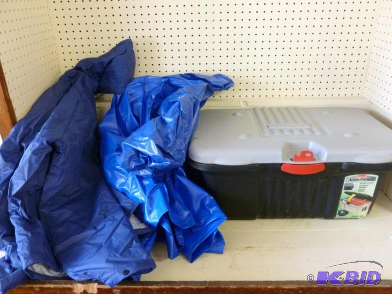 Large Rubbermaid tote with lid filled with ra...