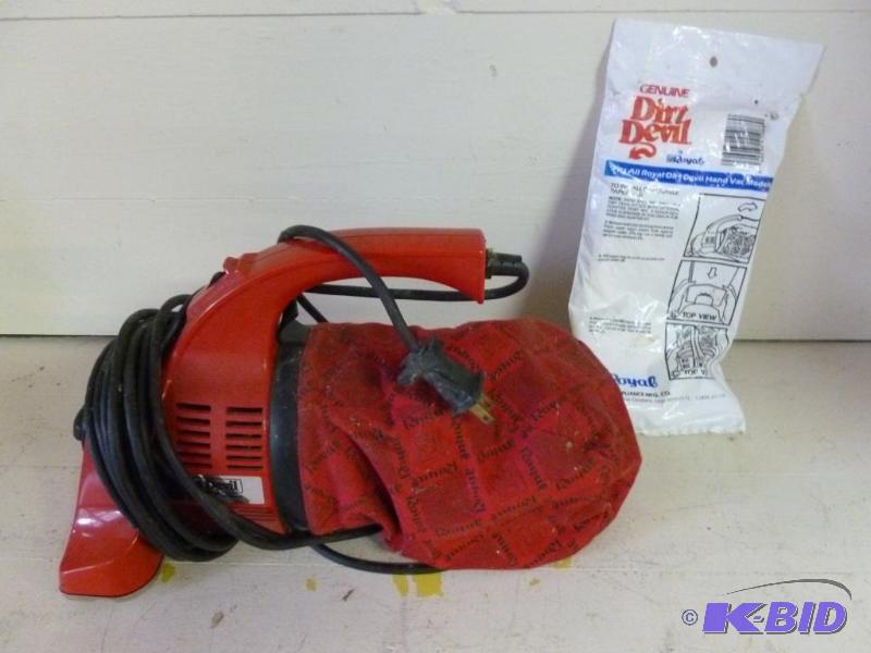 Dirt Devil hand vac, comes with two new bags,...