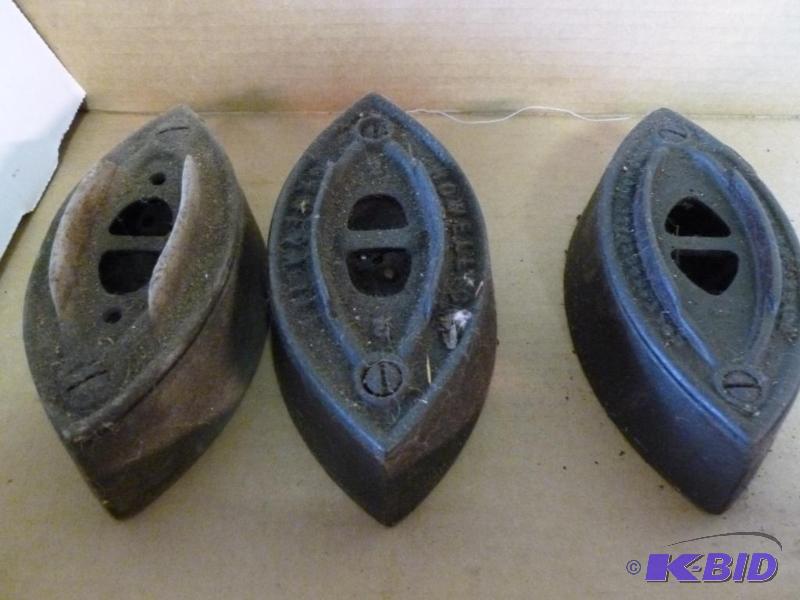 Lot of three antique sad irons....