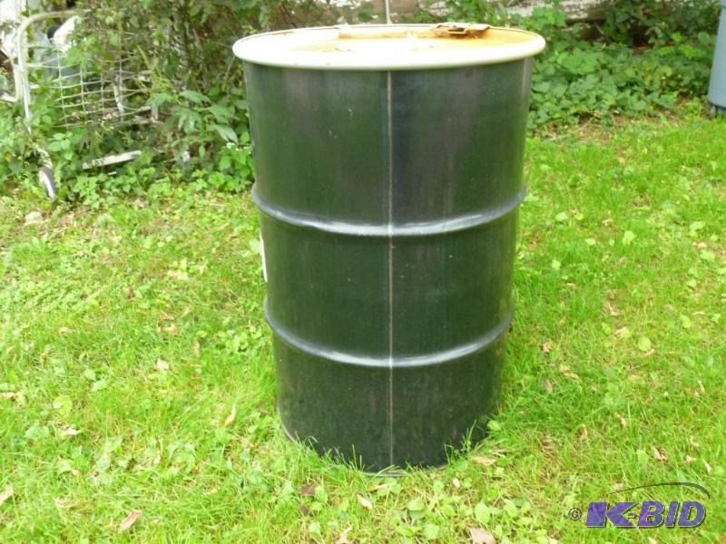 Large 55 gallon steel drum with lid, was fill...