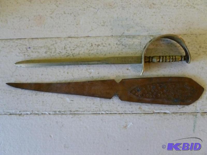 Lot of two vintage letter openers that includ...