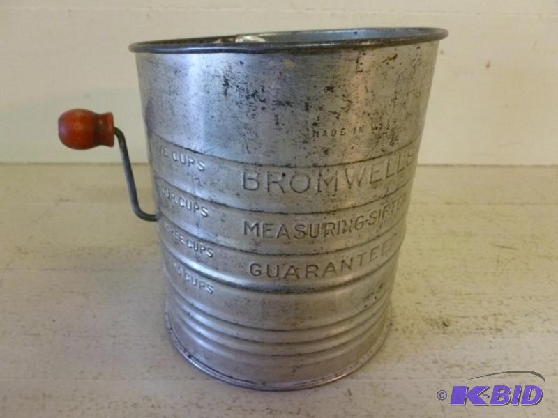 Large Vintage Bromwells red wood handled met...