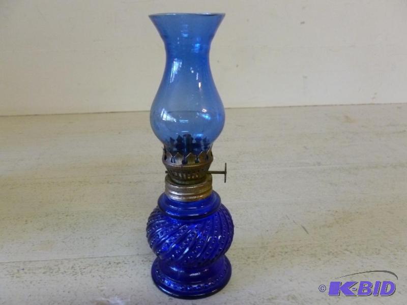 Vintage cobalt blue glass oil lamp that measu...