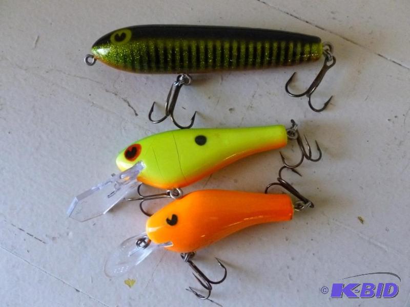 Lot of four large crank type fishing baits....