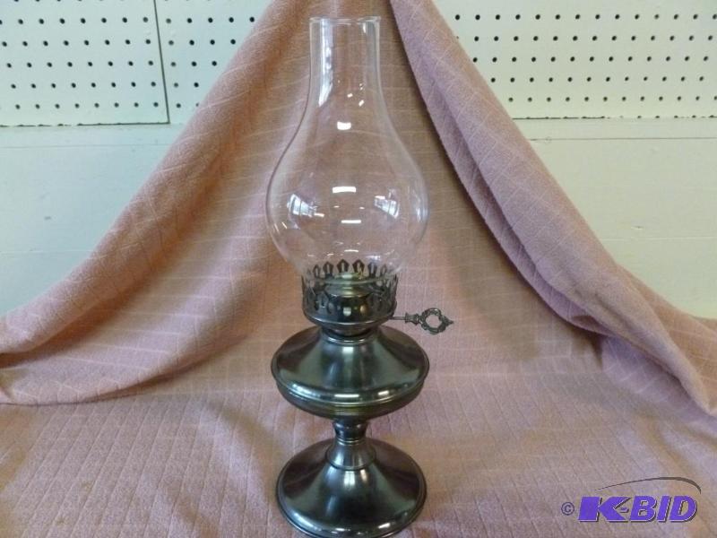 Metal bodied oil lamp that measures 16 14&qu...