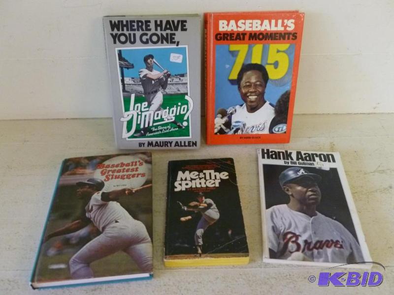 Lot of five sports collectible books....