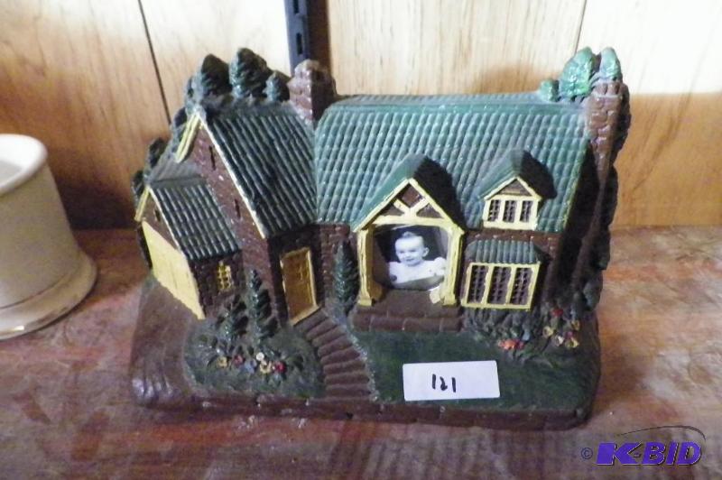 lot 121 image: Antique Deluxe Clock Co.  Clock was removed and replaced with a picture.