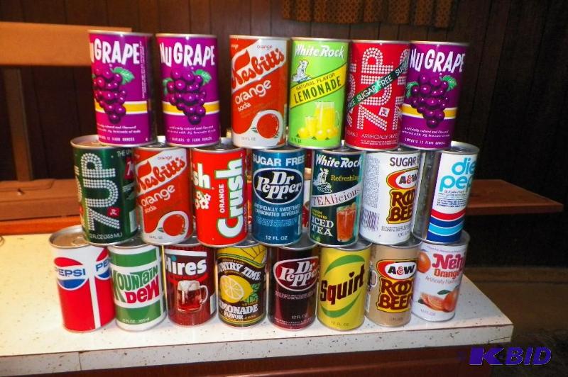 lot 13 image: 21 Old Sealed Empty Pop Cans