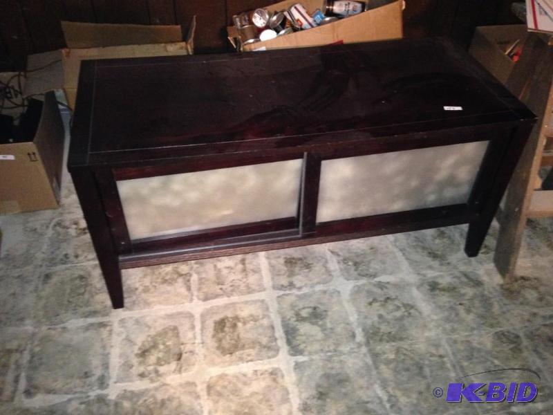 lot 153 image: Cabinet with two shelves and sliding glass doors 46 x  21 x 21