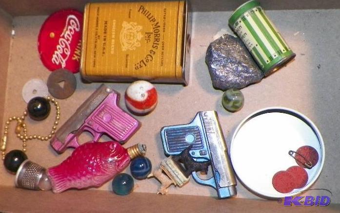 lot 250 image: Box of Misc. with 2 cap guns, Marbles WW II Ration Tokens and More