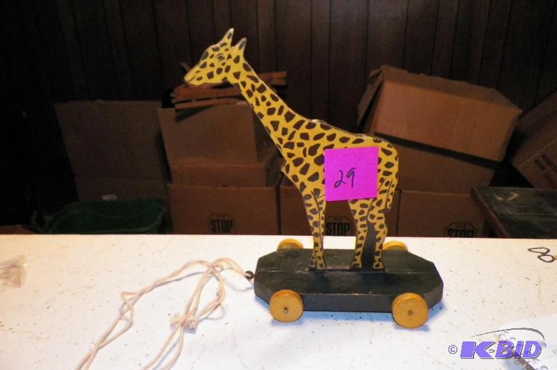 lot 29 image: Antique Giraffe Pull Toy.  Cool old toy